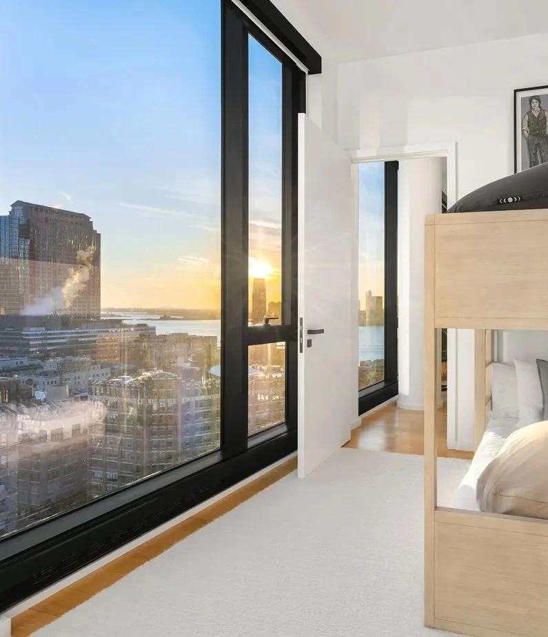 Residence interior with floor-to-ceiling windows