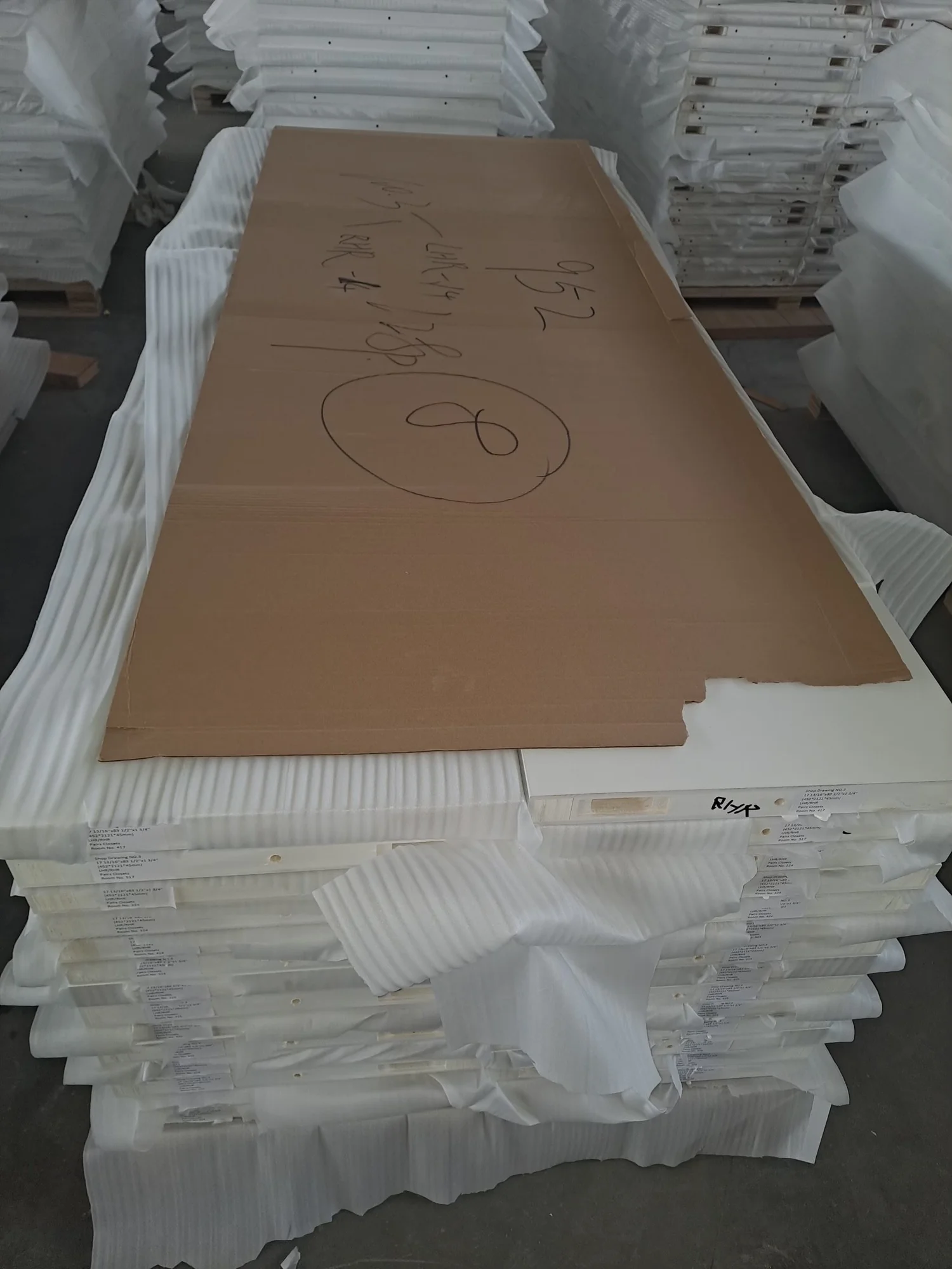 Factory-wrapped doors staged for delivery