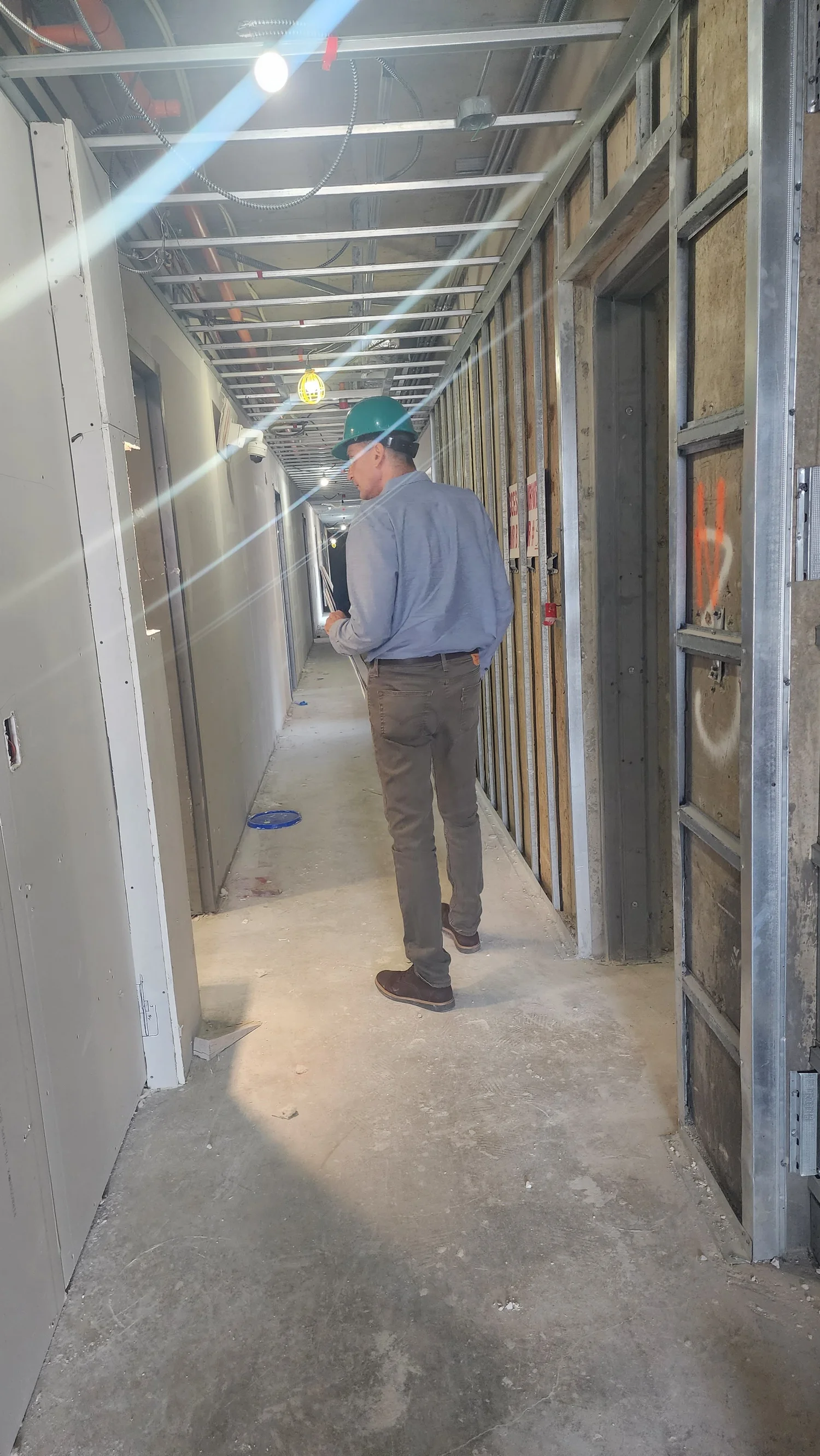 Corridor walkthrough during frame installation
